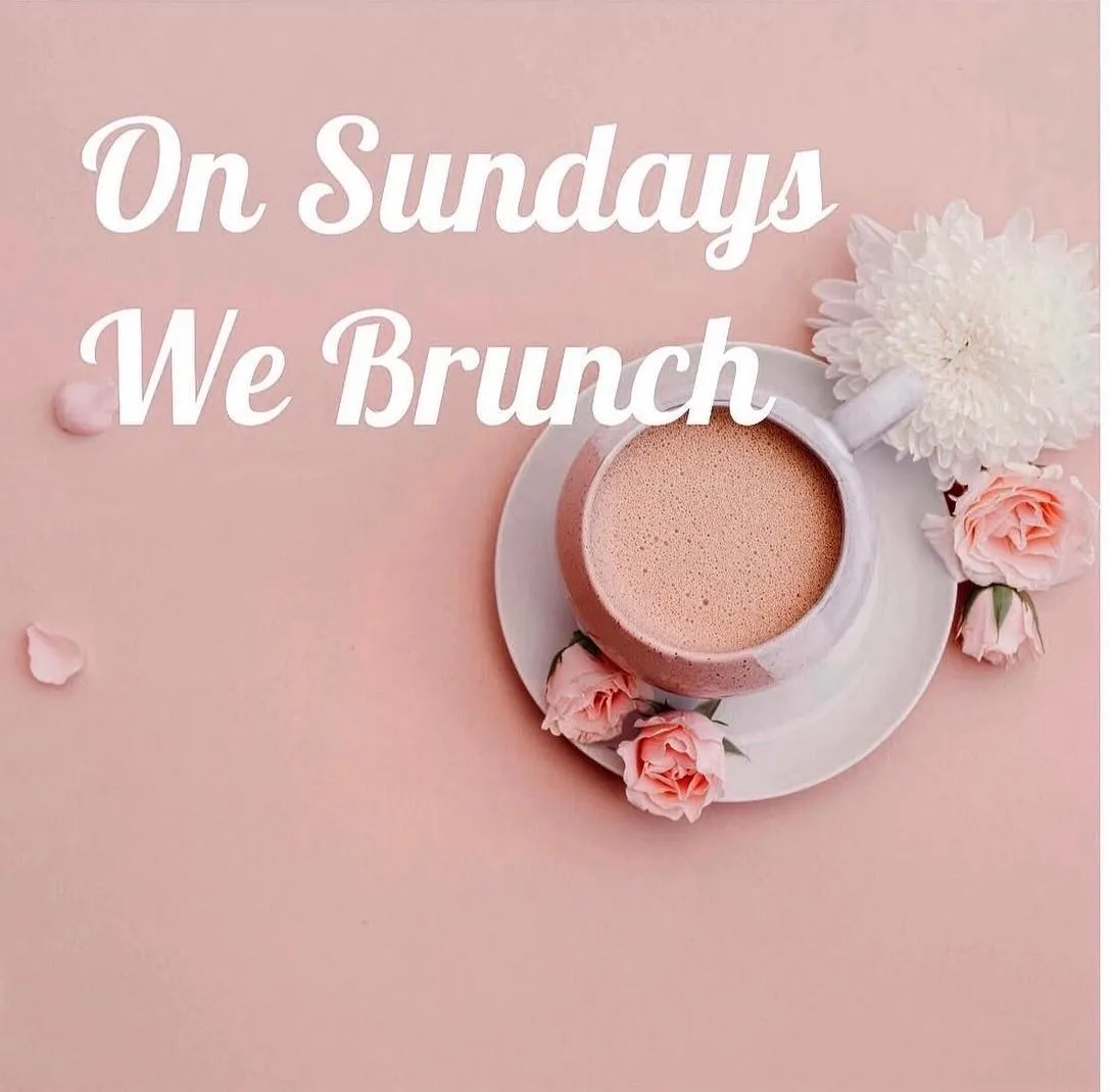 A cup of coffee and pale flowers on a soft pink background, with the On Sundays We Brunch wordmark